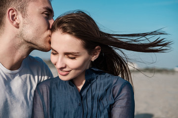 Fototapeta premium Young Couple Enjoying Beach Holiday