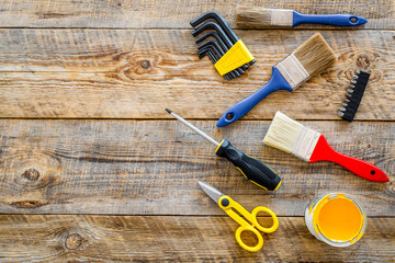 house renovation with implements set for building, painting and repair wooden table background top view mockup