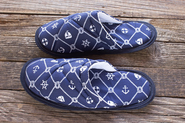 House slippers isolated on old wooden floor