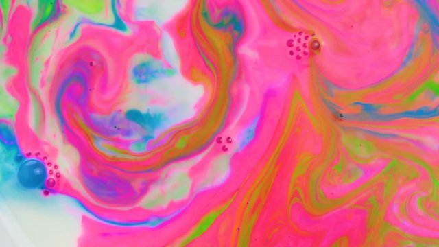 Drops floating in oil and water over colorful underground with oil painting effect