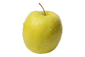 Yellow spelled appetizing apple dotted with drops of water on a white isolated background