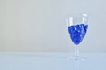 One wineglass with beautiful blue diamonds