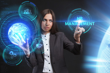 The concept of business, technology, the Internet and the network. A young entrepreneur working on a virtual screen of the future and sees the inscription: HR management