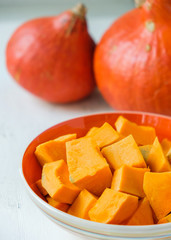 Orange pumpkin cut into pieces