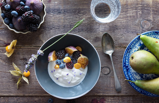Yogurt flavored with lavender and served with fruits.