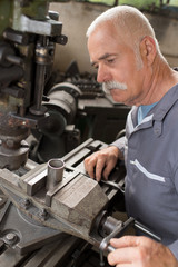 man working with instruments