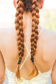 Braids of a Beautiful Young Redhead