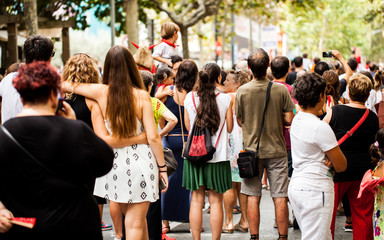 Crowd watching street entertainment