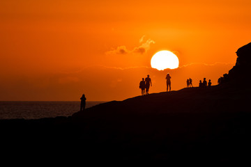 Naklejka premium Solar sunset silhouettes