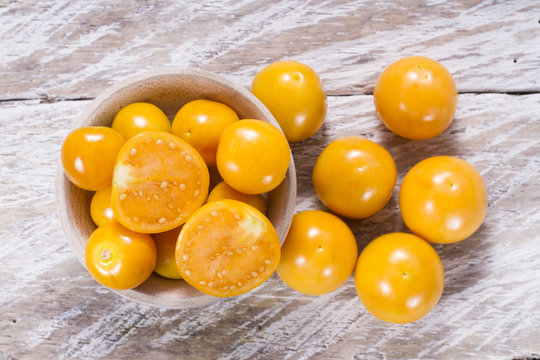 fresh uchuva fruits, The plant known as uchuva, uvilla, aguaymanto or ushun is a herbaceous plant belonging to the family solanaceae (Physalis peruviana)