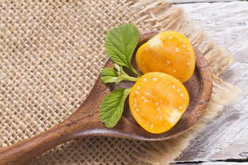 fresh uchuva fruits, The plant known as uchuva, uvilla, aguaymanto or ushun is a herbaceous plant belonging to the family solanaceae (Physalis peruviana)