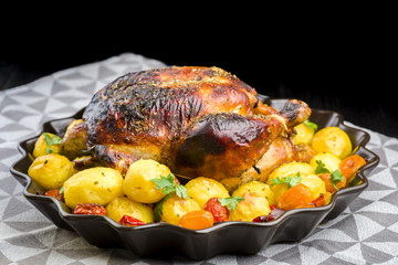roast chicken with potatoes