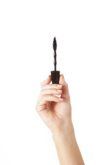 Hand with mascara isolated on white