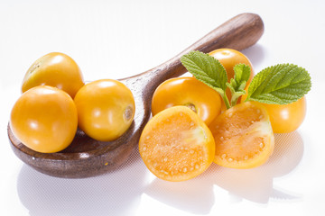 fresh uchuva fruits, The plant known as uchuva, uvilla, aguaymanto or ushun is a herbaceous plant belonging to the family solanaceae (Physalis peruviana)