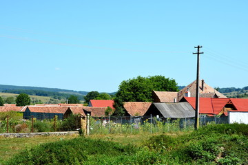 Typical rural landscape and peasant houses in  the village Toarcla, Tartlau, Transylvania, Romania....