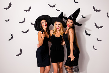 Boo! Three terrifyng mysterious emotional flirty dark mistress monsters in elegant costume...