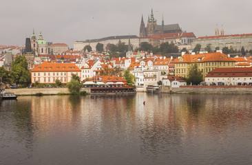 Fototapeta premium Prague Castle, the Vltava River and the historic center of Prague in the autumn morning. Prague, Czech Republic