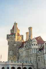 Fototapeta premium sun setting over Casa Loma castle in Toronto