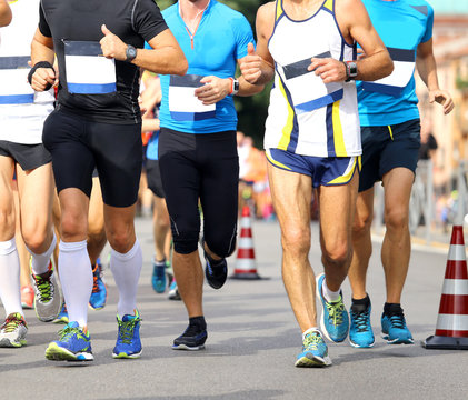 athletes during the marathon on the road