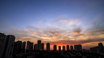 Obraz na płótnie Canvas Ribeirao Preto city in Sao Paulo, Brazil. Region of Joao Fiusa Avenue in sunset day.