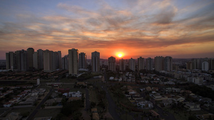 Ribeirao Preto city in Sao Paulo, Brazil. Region of Joao Fiusa Avenue in sunset day.