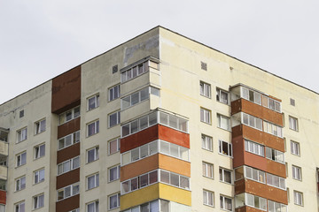 windows and balconies of a multi-storey building