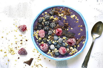 Berry smoothie with chocolate and oats.Top view.