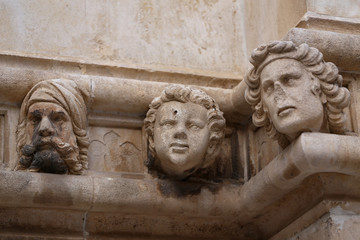 Sibenik cathedral / Famous faces on the side protal of Sibenik cathedral