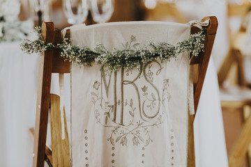 Decorated Wedding Reception Chair in Barn Reception Venue