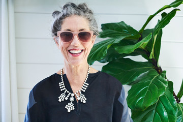 Portrait of stylish senior woman at home