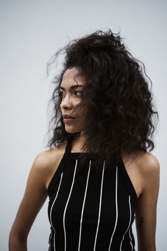 Woman Looking Curiously To The Side