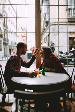 young couple chilling in a cafe