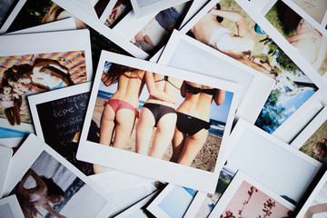 Close-up of three girls on beach