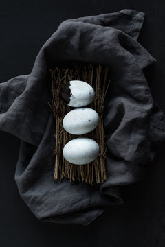 Three eggs on a fabric linen
