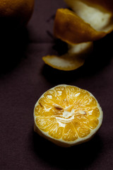 Fresh ripe lemons on Dark vintage background. Dark n Moody style macro lense