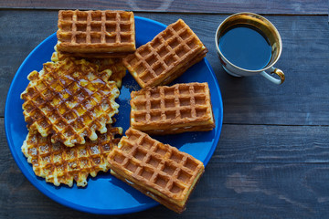 Coffee and Waffle on blue plate