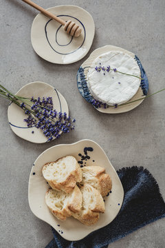 Artistic plate with camembert and lavender