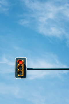 Traffic Light Against a Blue Sky