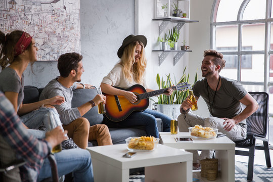 Group of friends having fun at home