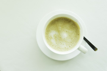 Top view of a cup of cappuccino