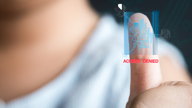 Concept of the future of security through fingerprints , asian kid girl scan fingerprints