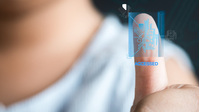 Concept of the future of security through fingerprints , asian kid girl scan fingerprints