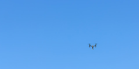 Drones flying in the sky for shooting video.