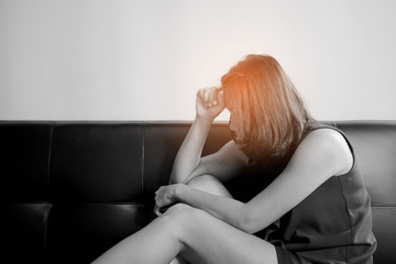 woman feeling sad at window . lonely