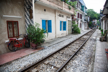 Fototapeta na wymiar HANOI VIETNAM - AUGUST 2017: Life of people who live near the railway in Hanoi ancient town.