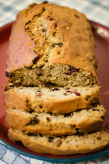 Fresh baked banana bread with fruit and nuts