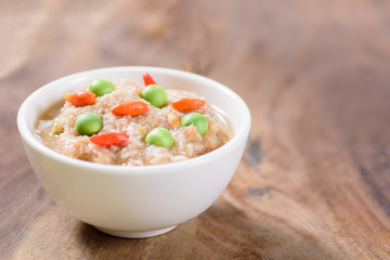 Thai food (Nam Prik Kapi),shrimp paste chili dip in a bowl on wooden background