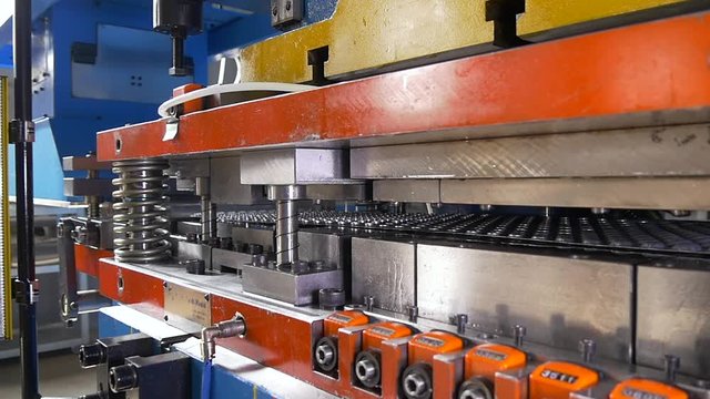 Manufacture of metal tubes on industrial CNC machine in factory slow motion. Automation of work. Refrigeration and ventilation industrial equipment and air conditioners. Modern technologies.