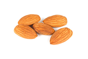 Closeup of almonds, isolated on the white background.