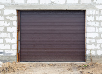 gates in a garage with brick walls